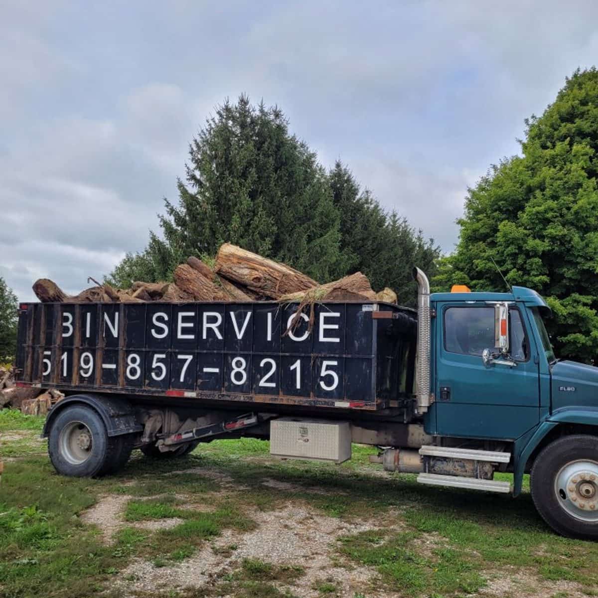 Beaver Tree bin-service truck loaded with cut firewood